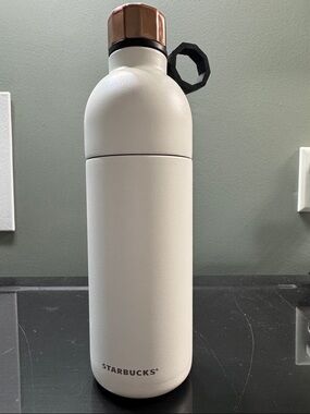 Starbucks white Insulated Bottle with Rose Gold Cap and Black Handle travel cold